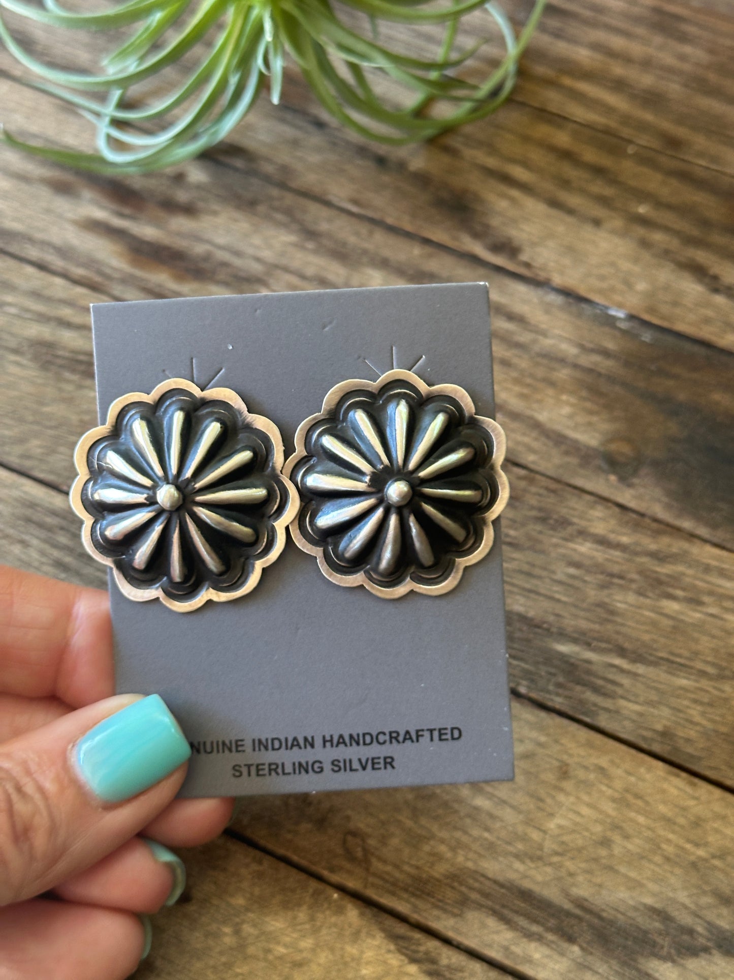 Native made Concho—sterling silver earrings