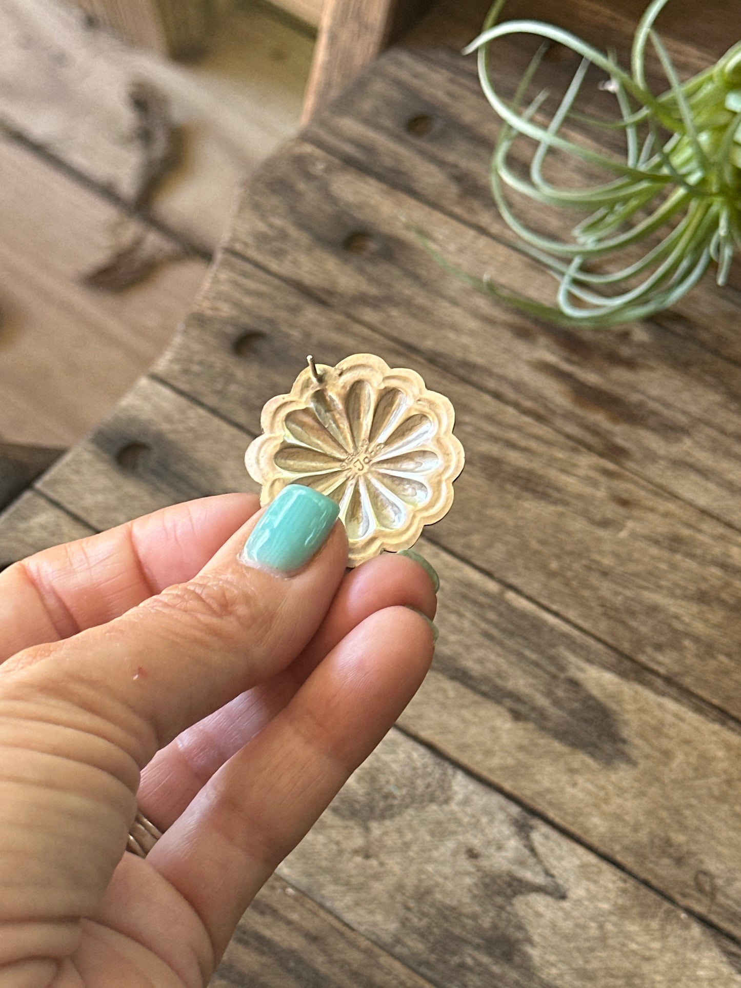 Native made Concho—sterling silver earrings